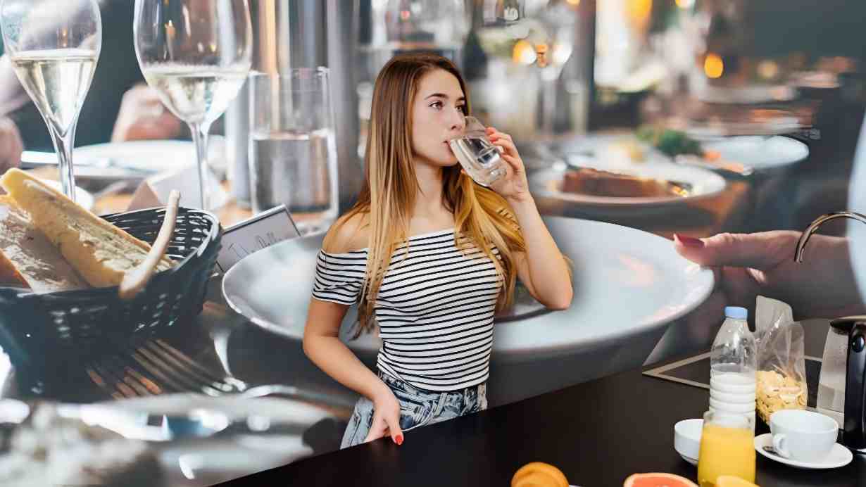 Drinking Water in Restaurant